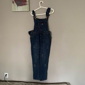 Blue denim romper with rips
